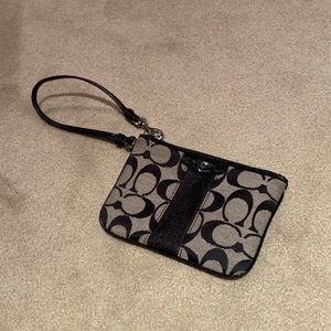 Black Coach wristlet never used